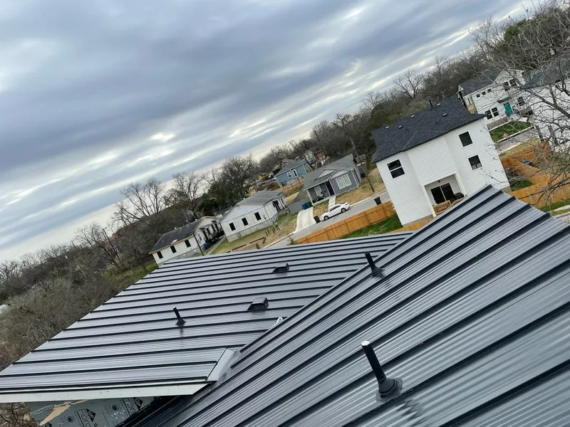 Standing seam metal roof panels with vents for Skylight Repair in Libertyville